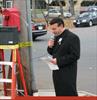  Chuck's lifetime friend Anthony Bisignano as he delivers his heartwarming words on a cold day for Chuck's Street sign dedication ceremony.  November 2002