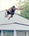 The Annual leap from the house roof into the family pool on the 4th of July