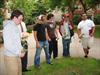  Michael, current Delt and nephew of Chuck, placing flower at memorial tree on 9-11-06