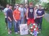  Delta Tau placeing flowers at tree dedicated to Frat brothers lost on 9-11.  (9-11-04)