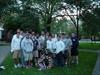  On the one year anniversary of 9-11, current Delts, including Chuck's nephew Michael (hooded sweatshirt) place wreath at tree planted for the fallen Delts.