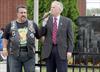  Congressman Michael McMahon who attended Monsignor Farrell with Chuck, tells a funny story about Chuck, with Mike Margiotta next to him and the 9/11 memorial behind both of them.