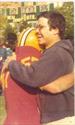  This is the most meaningful pic I have of my brother.  He traveled home from Rhode Island DURING his football season to watch me avenge a loss we suffered the previous year.  As you can see on the scoreboard...we won the city Championship 7-6. (1975)