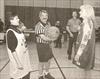 Norma Margiotta & the wife of Firefighter Fiore get ready for the start of the game between L-85 & Rescue 5.  The league was renamed in honor of their husbands.  The Fiore-Margiotta FDNY Basketball League.