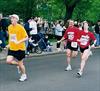  Barbara Jane Vaccaro, running in memory of Chuck, legging out her father Joe just steps before the finish line.