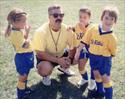 Coaching his daughters soccer team