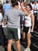  Sarah Margiotta (right), enjoys a laugh with HS friend Melissa Kraft prior to Sarah's run in Chuck's honor.