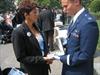  Norma receiving Chuck's Congressional Medal Of Valor.