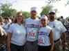  Me and my wife Patti giving support to my daughter Sarah and her boyfriend Dennis before they start their race they were dedicating to Chuck.