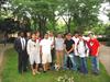  Old and new members of Delta Tau at memorial tree on 9-11-06.  Michael Margiotta 

( Chuck's God child) holding tree.  9-11-06