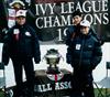  left to right: Chuck's daughter Norma Jean, wife Norma & son Charlie, pose with the IVY LEAGUE CHAMPIONSHIP CUP.