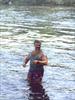  Fishing in stream on his property in the Adirondacks.