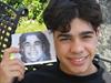  For anyone who hasn't seen Chuck's son in a while, here is a pic of him from July 2005, holding a picture of Chuck.  Charlie is entering his sophomore year at Msgr. Farrell HS.